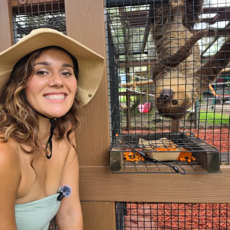 Kaleigh meeting a sloth at a Central Florida animal encounter
