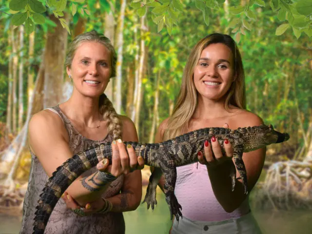 Holding a young alligator at Wild Florida in Kenansville